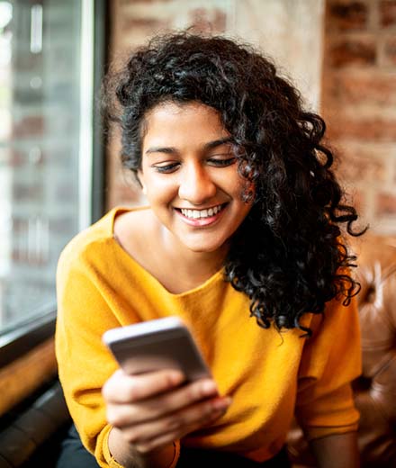 Woman using mobile banking.