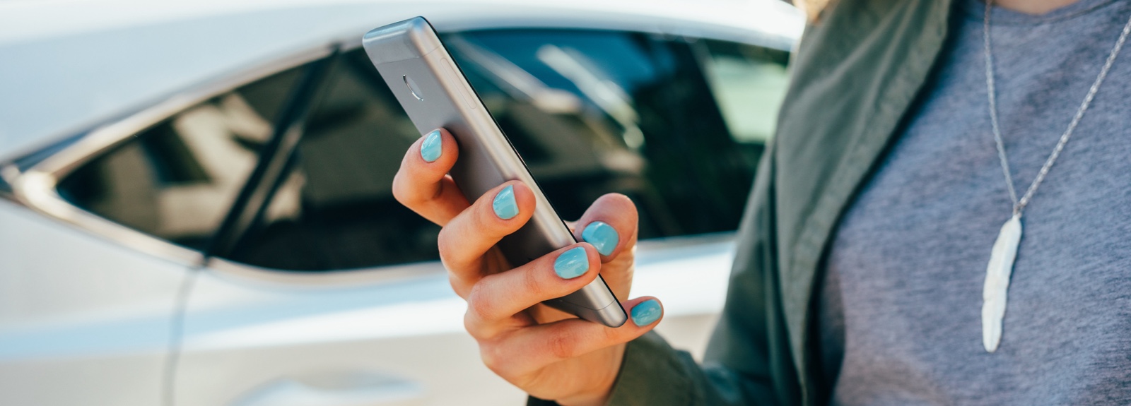 Close up of a person's hands holding a smart phone