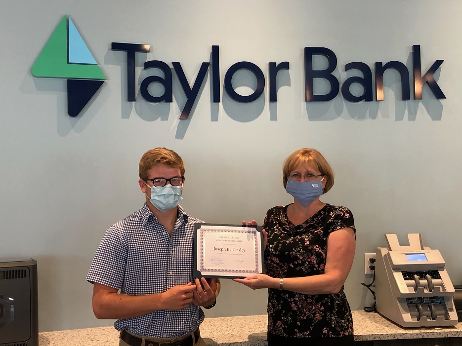 Shannon Lewis, AVP, Branch Manager/Relationship Officer, is pictured presenting the scholarship certificate to Joseph Teasley at the Onley, Virginia Branch
