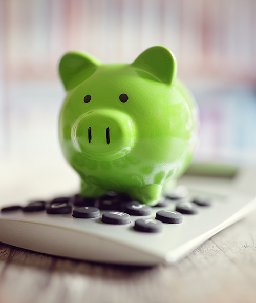 Piggy bank with calculator.
