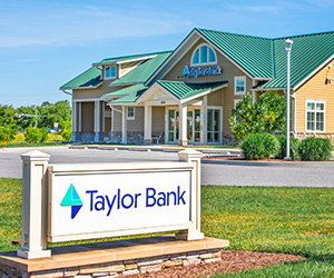 Exterior view of the Taylor Bank Ocean landing Branch on a sunny day.